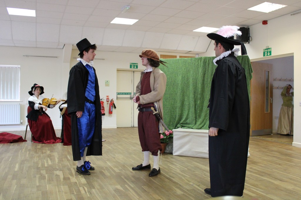 A group of people on stage.