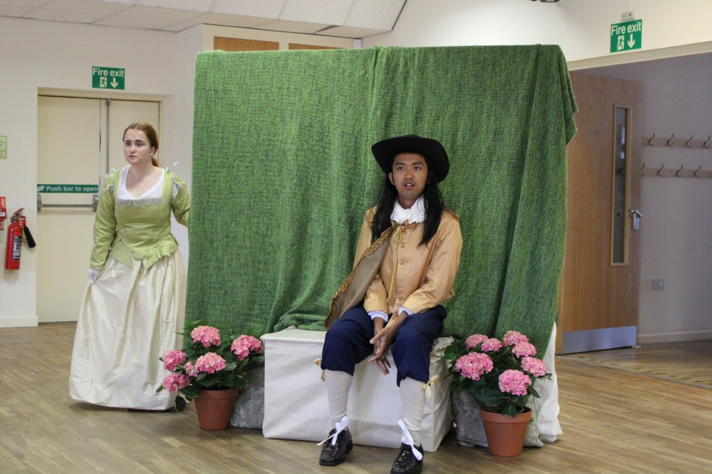 A woman and a man in early modern costume