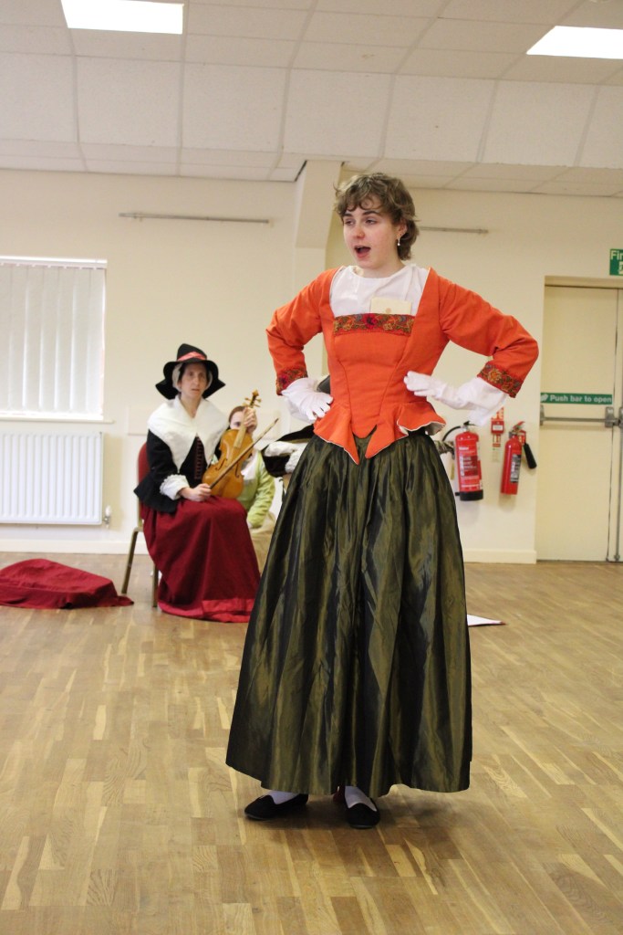 A woman in Tudor costume