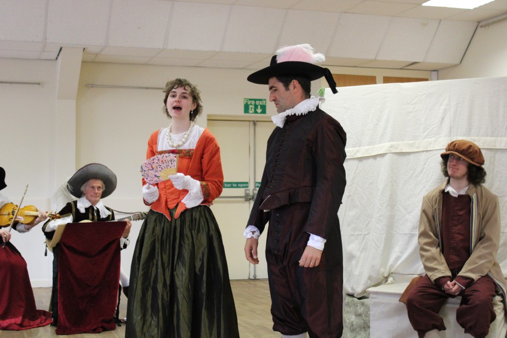 A group of people in early modern costume