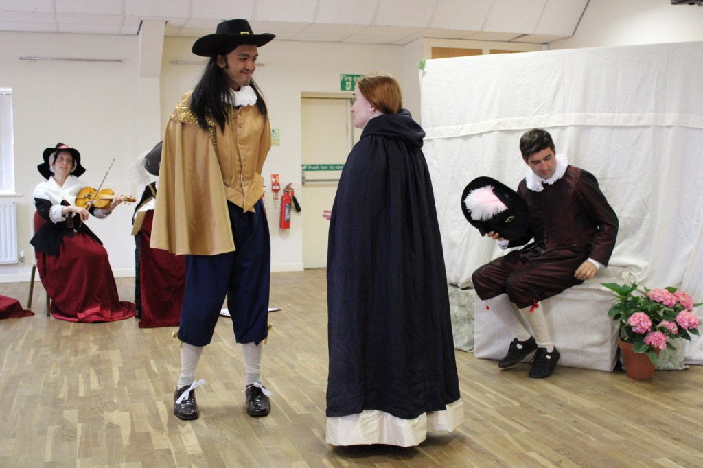 A group of people in early modern costume