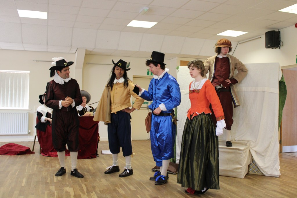 A group of people in period costume