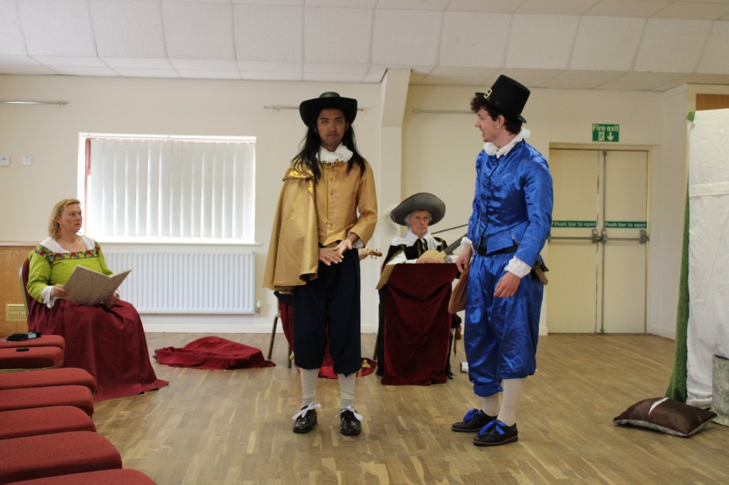 A man talking to another man