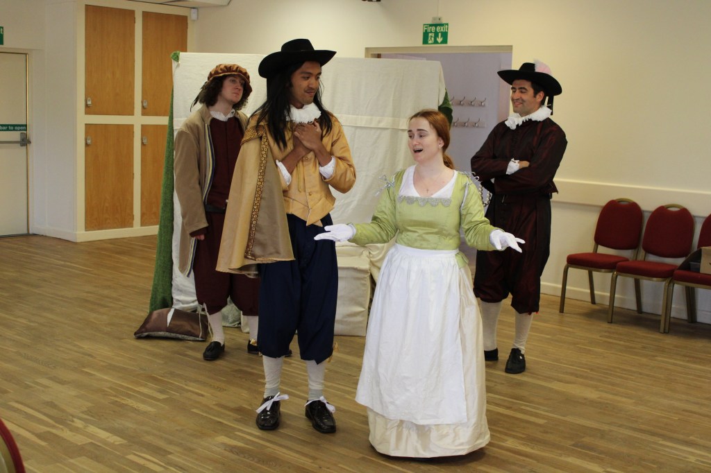 A group of people in early modern costume