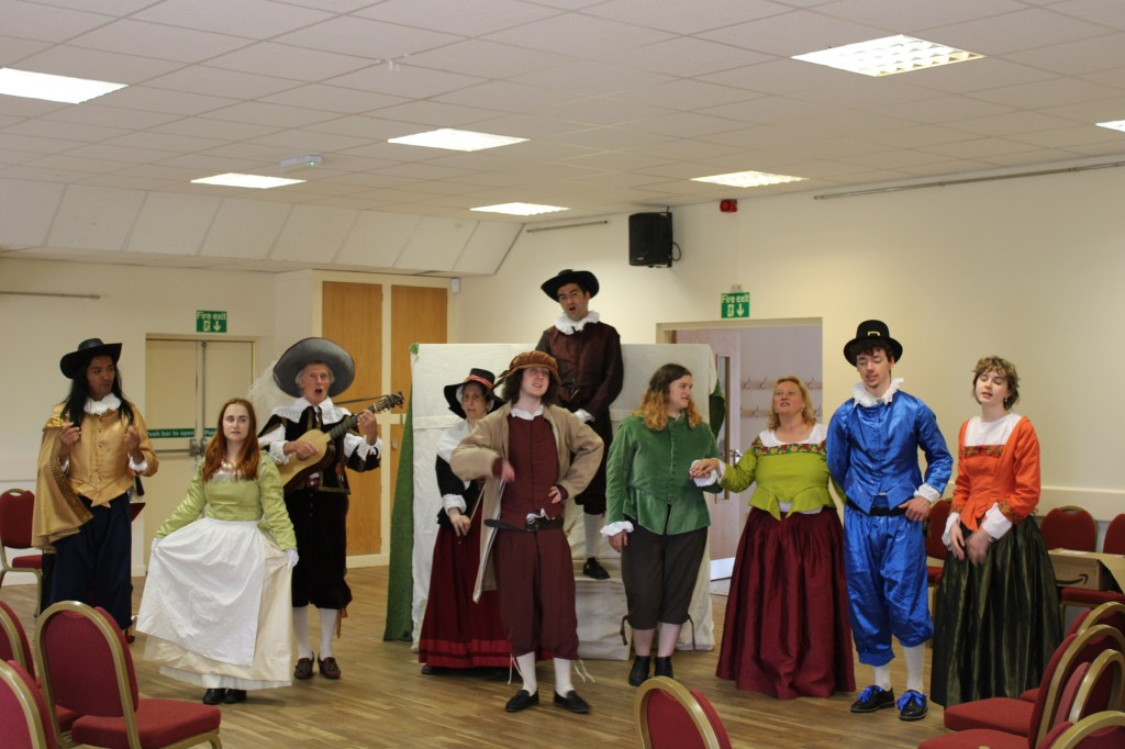 A group of people in Tudor and Stuart costume 